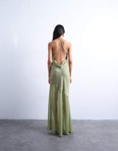 Model wearing Occasion mixed fabric cowl neck dress in soft green