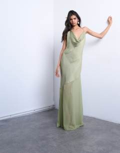 Model wearing Occasion mixed fabric cowl neck dress in soft green