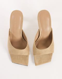 Model wearing Octavia strappy high diamante heel sandal in taupe