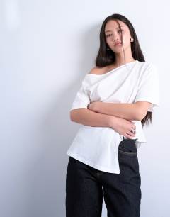 Model wearing Off shoulder asymmetric top with cinch detail in ivory