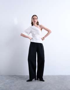 Model wearing Off shoulder drape neck in white