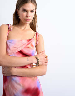 Model wearing Off shoulder midi dress in abstract pink print
