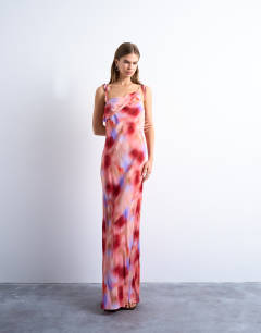 Model wearing Off shoulder midi dress in abstract pink print