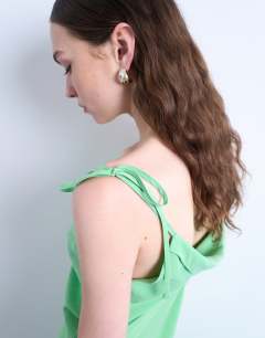 Model wearing Off shoulder midi dress in apple green