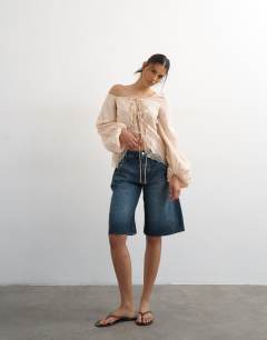 Model wearing Off shoulder tie detail lace trim blouse in ecru