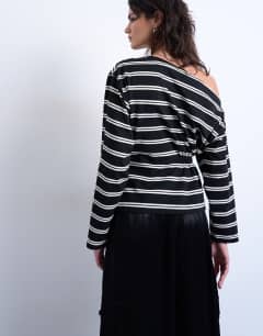 Model wearing Off the shoulder ruched detail long sleeve top in stripe
