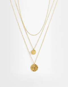 Model wearing Oliver waterproof stainless steel multi layer necklace in gold