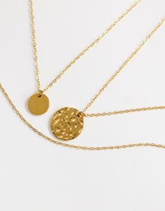 Model wearing Oliver waterproof stainless steel multipack necklace in gold