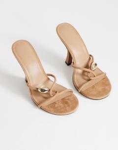 Model wearing Olivia strappy high heel sandal with ball detail in taupe faux suedette