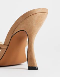 Model wearing Olivia strappy high heel sandal with ball detail in taupe faux suedette