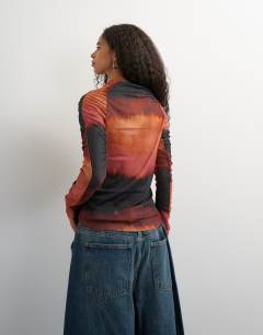 Model wearing Ombre ruched long sleeve top
