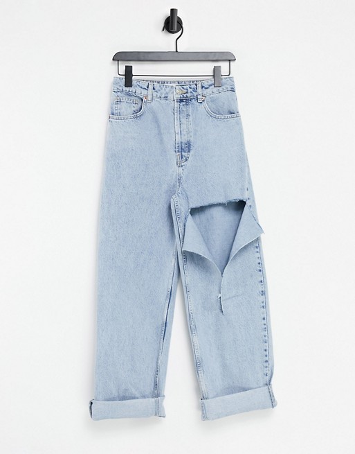 Topshop oversized Mom jeans with rip in bleach