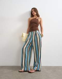 Model wearing One shoulder beaded strap top in chocolate