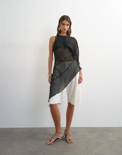 Model wearing One shoulder cape detail tunic in black