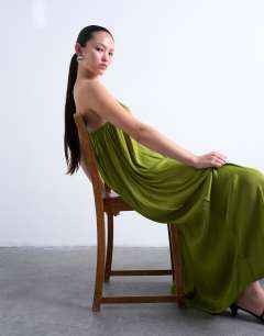 Model wearing One shoulder chuck on liquid satin dress in green