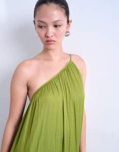 Model wearing One shoulder chuck on liquid satin dress in green