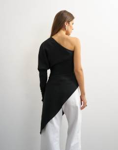 Model wearing One shoulder draped long sleeve asymmetric tunic in black