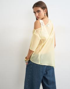 Model wearing One shoulder organza top in lemon