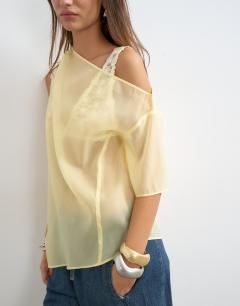 Model wearing One shoulder organza top in lemon