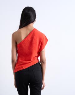 Model wearing One shoulder top in red