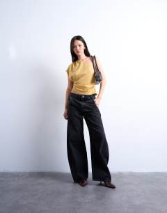 Model wearing One shoulder top in tan stripe