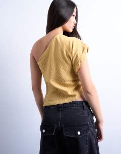 Model wearing One shoulder top in tan stripe
