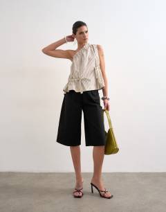 Model wearing One shoulder woven stripe top in mono