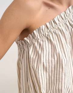 Model wearing One shoulder woven stripe top in mono