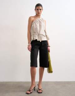 Model wearing One shoulder woven stripe top in mono