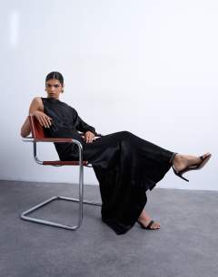 Model wearing One sleeve twist strap satin maxi dress in black