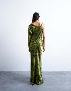 Model wearing One sleeve twist strap satin maxi dress in green floral