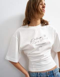 Open archive graphic structured waist tee in white