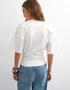 Model wearing Open archive graphic structured waist tee in white
