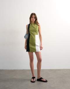 Model wearing Open back linen mini dress in khaki colour block