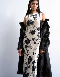 Model wearing Open back satin midi dress in black white floral