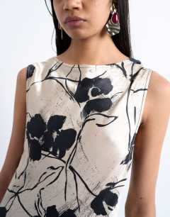 Model wearing Open back satin midi dress in black white floral