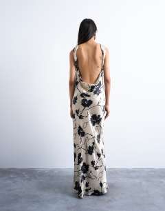Model wearing Open back satin midi dress in black white floral