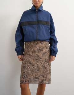 Model wearing Organza 90s length skirt in zebra print