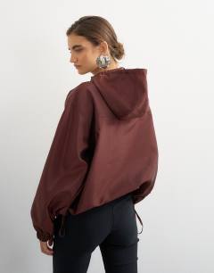 Model wearing Organza bomber in brown