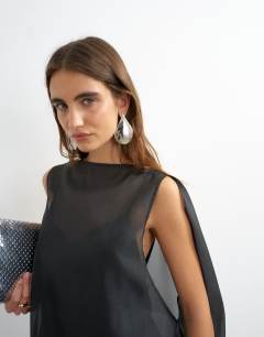 Model wearing Organza bubble hem mini dress in black
