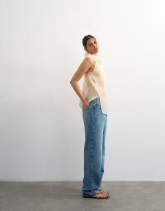 Model wearing Organza collapsed funnel neck top in oyster