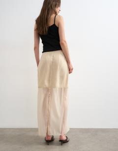 Model wearing Organza column maxi skirt with contrast stitching in oyster
