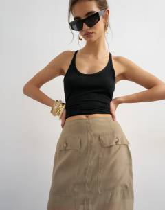 Model wearing Organza column maxi skirt with pockets in brown mink
