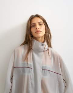 Organza funnel neck bomber with contrast binding in grey