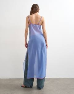 Model wearing Organza longline cami in blue with contrast orange tipping