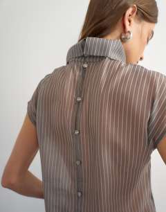 Model wearing Organza pinstripe high neck top in grey