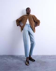 Model wearing Original Mom high rise jean in bleach