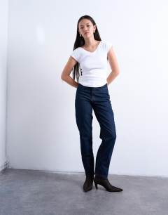 Model wearing Original Mom high rise jean in indigo rinse