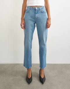 Model wearing Orson comfort stretch straight leg ankle grazer jean in bleach