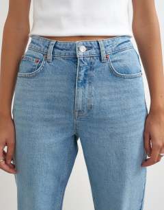 Model wearing Orson comfort stretch straight leg ankle grazer jean in bleach